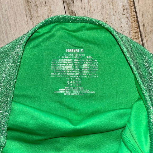 Green, sparkly deep v-neck bodysuit/bathing suit. - Picture 2 of 4